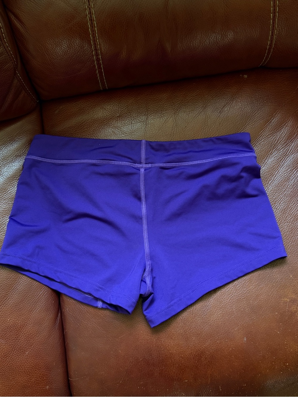 Nike Purple Athletic Shorts with White Swoosh Logo - Picture 3 of 4